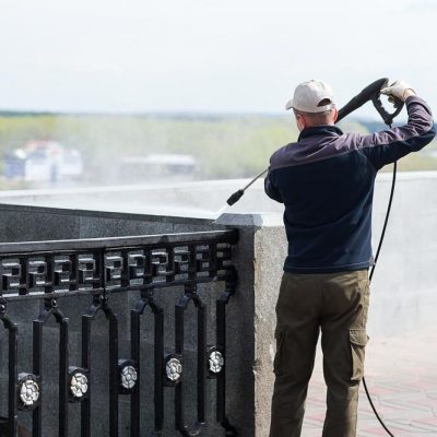 Cleaning Balcony of Building